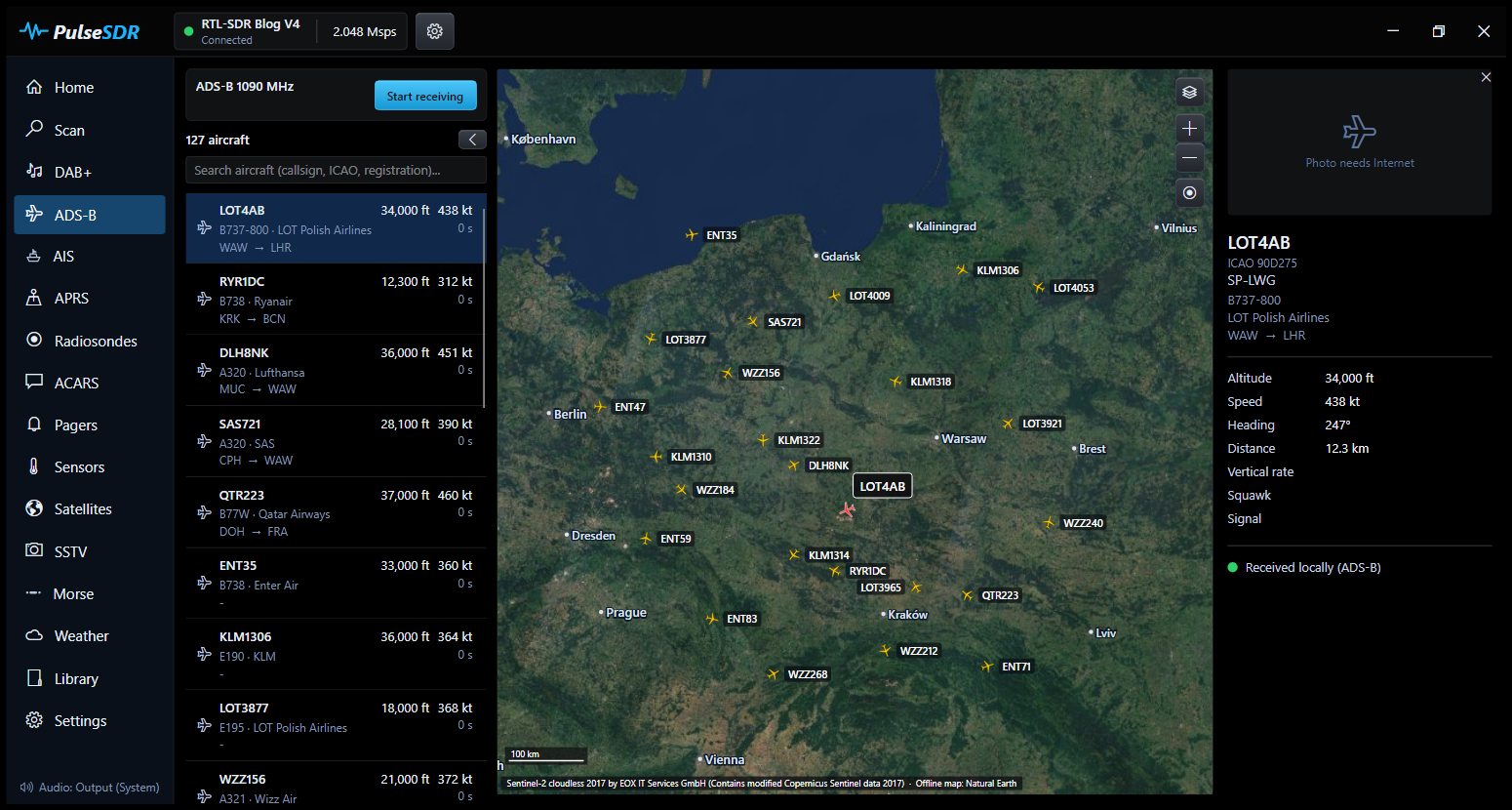 The ADS-B page: a list of aircraft, a satellite map of Poland with aircraft and the details of one flight